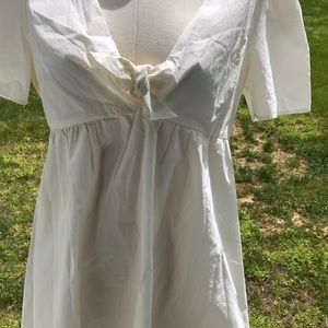 Cream-colored baby doll dress